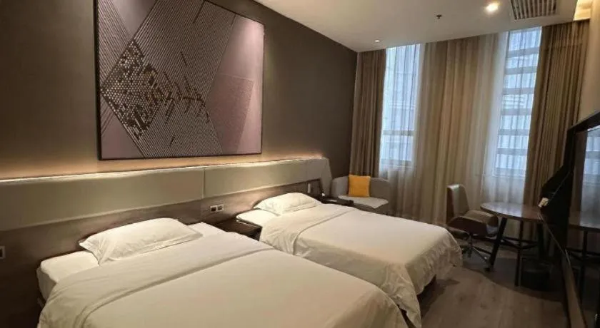 Bed in IU Hotels· Wuhan Jianghan Road Metro Station
