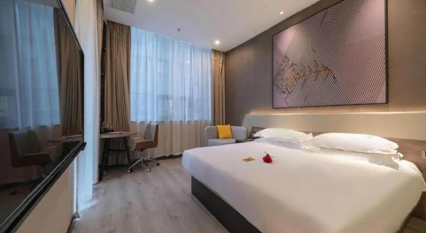 Bed in IU Hotels· Wuhan Jianghan Road Metro Station