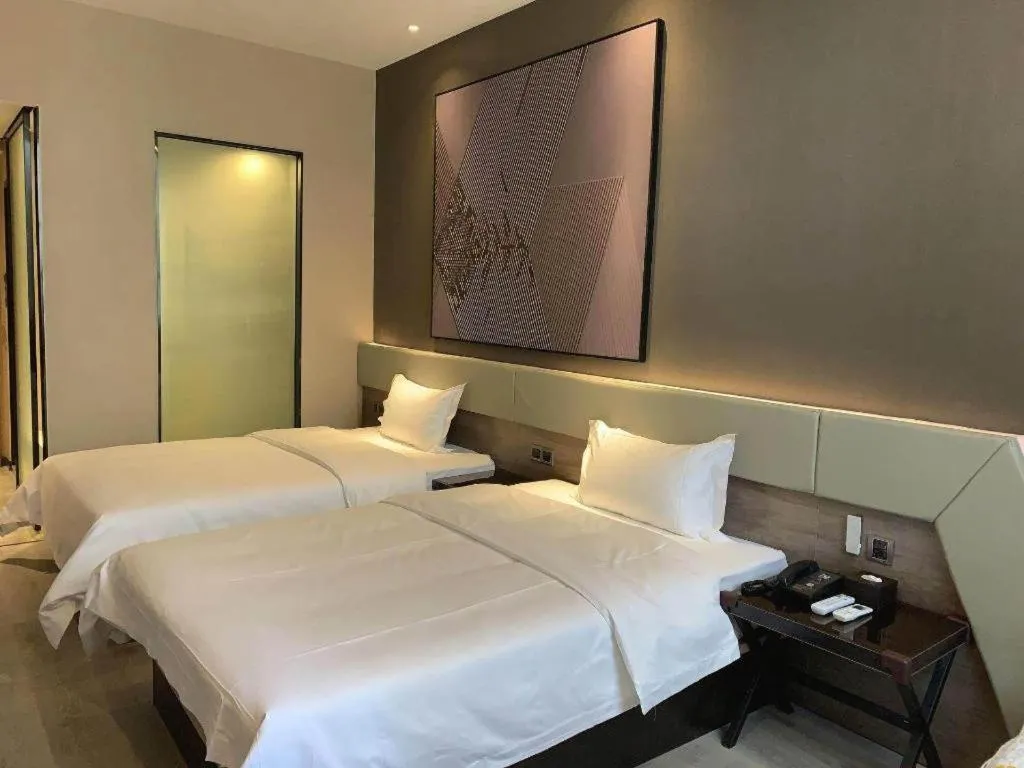 Bed in IU Hotels· Wuhan Jianghan Road Metro Station