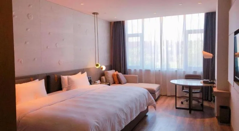 Bed in Zhejiang Cloud Mountain Deefly Hotel