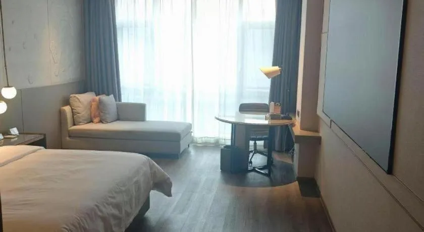 Bed in Zhejiang Cloud Mountain Deefly Hotel