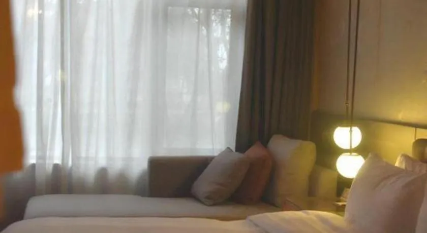 Bed in Zhejiang Cloud Mountain Deefly Hotel