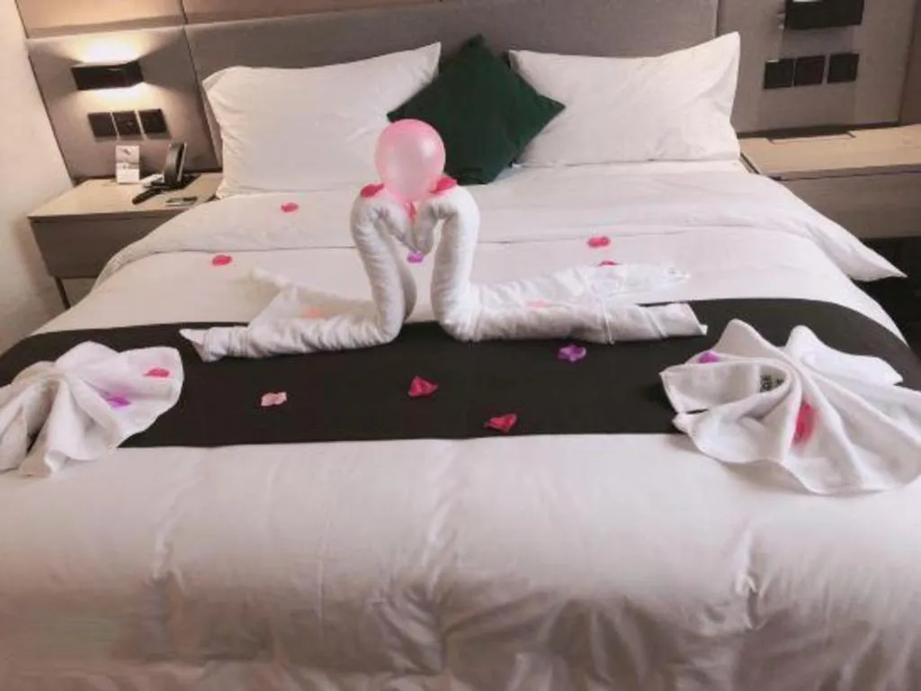 Bed in UP and IN Hotel Jiangxi Nanchang City Nanchang County Liantang Zhong Avenue Huarunwanjia