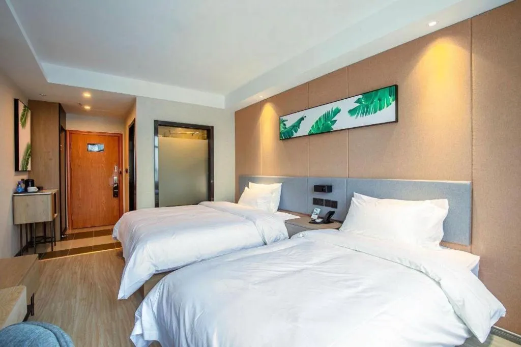 Bed in UP and IN Hotel Jiangxi Nanchang City Nanchang County Liantang Zhong Avenue Huarunwanjia