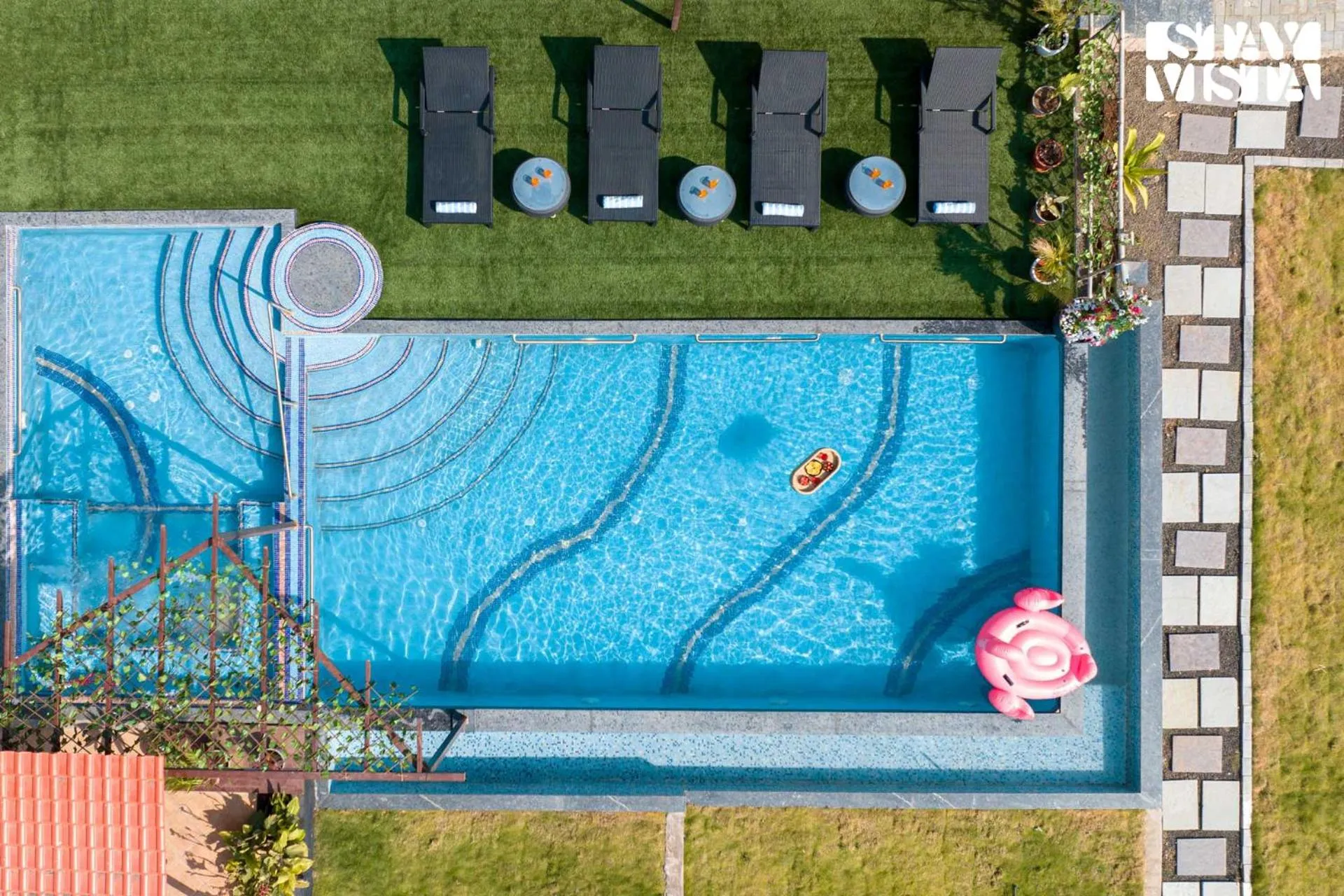 Swimming pool in StayVista at Mangifera Agro Estate with Pool, Wi-Fi