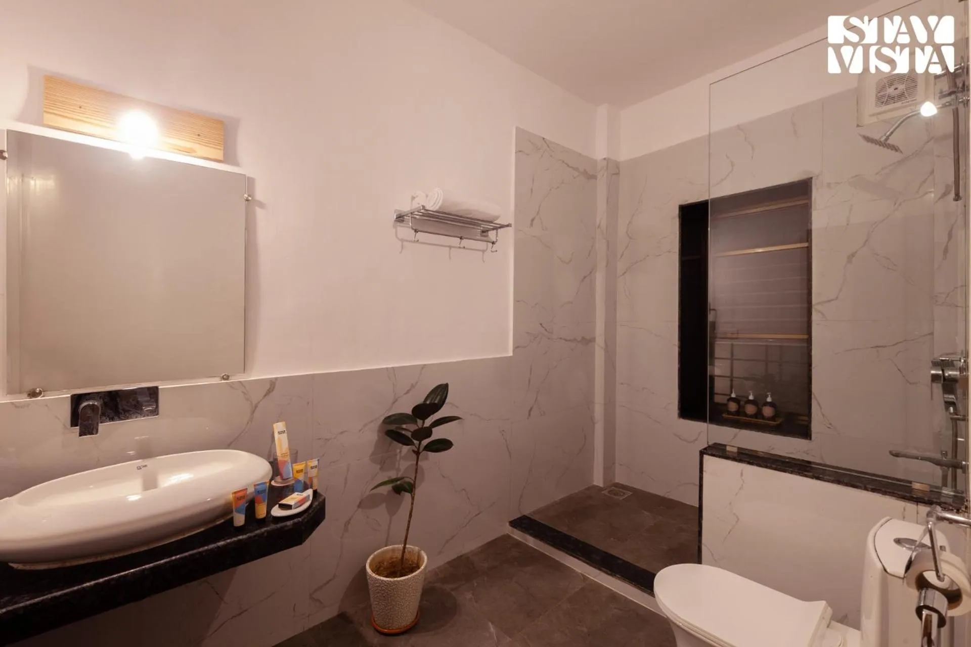 Bathroom in StayVista at Mangifera Agro Estate with Pool, Wi-Fi