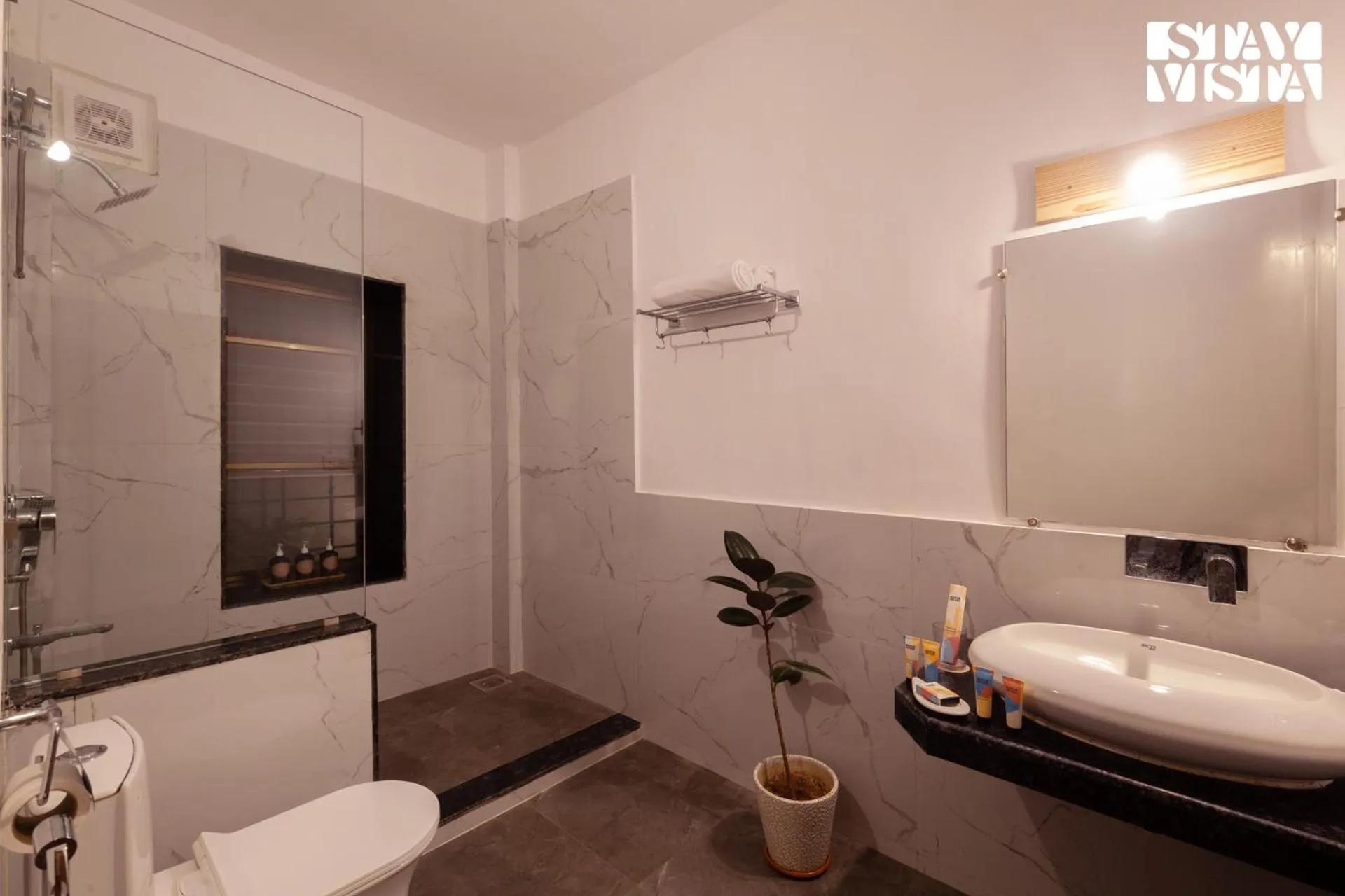 Bathroom in StayVista at Mangifera Agro Estate with Pool, Wi-Fi