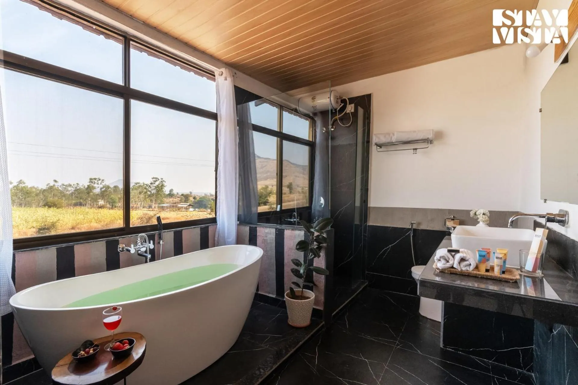 Bathroom in StayVista at Mangifera Agro Estate with Pool, Wi-Fi