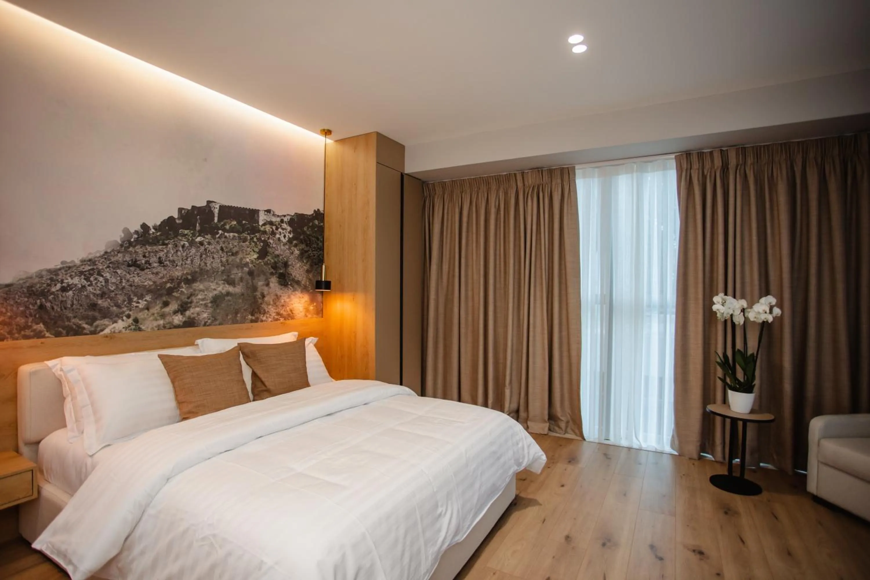 Bed in Oro Inn Hotel