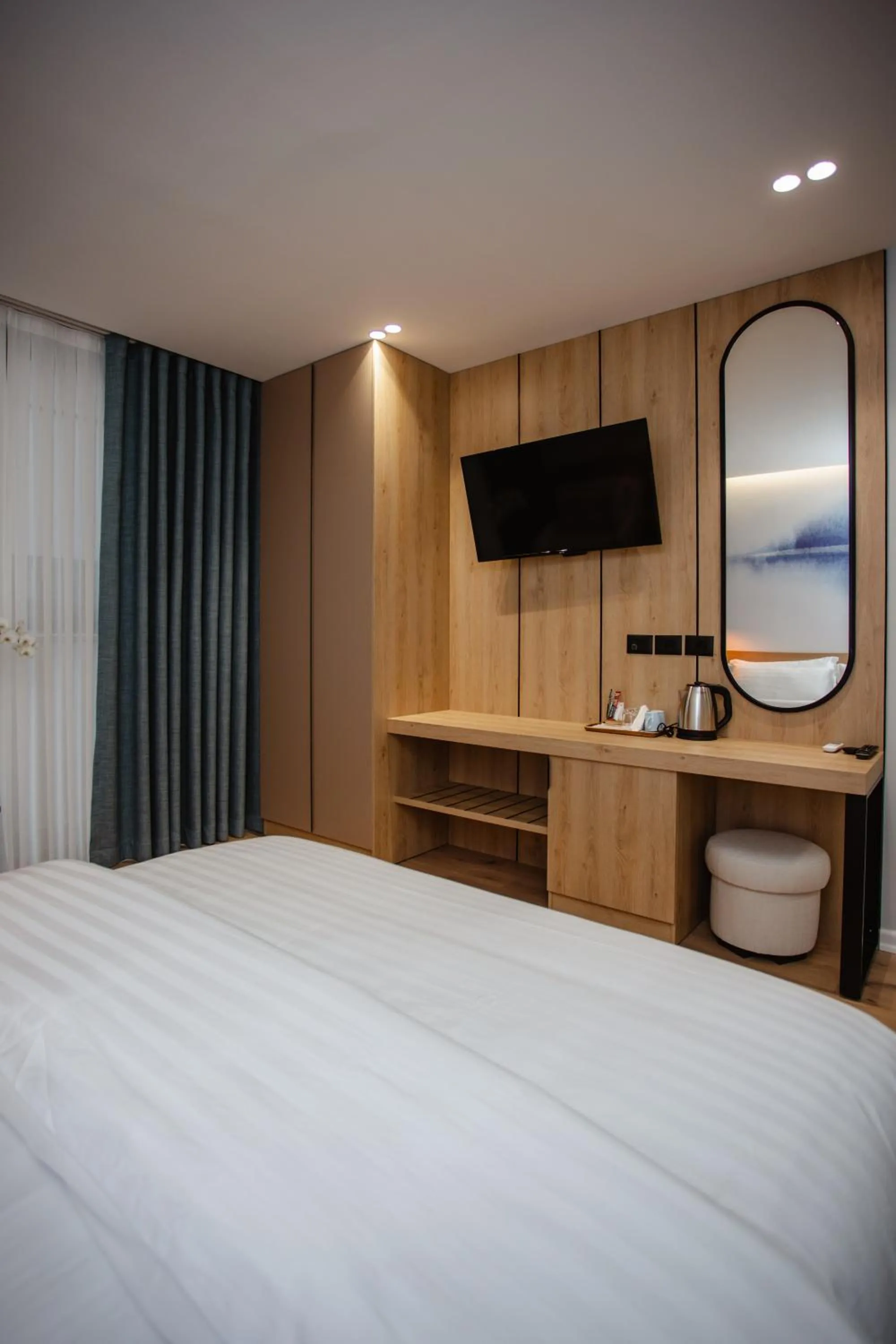 Bed in Oro Inn Hotel