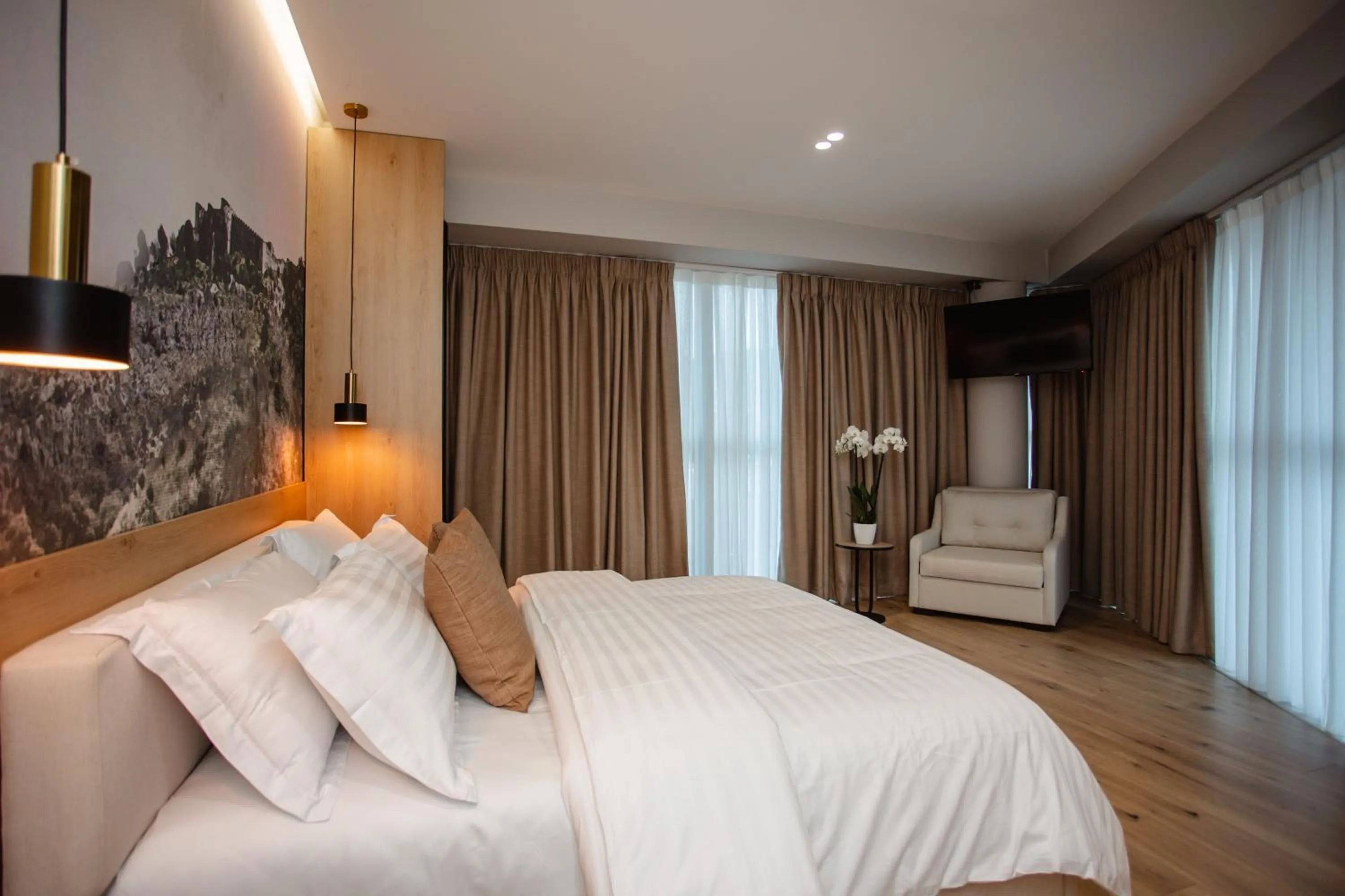 Bed in Oro Inn Hotel