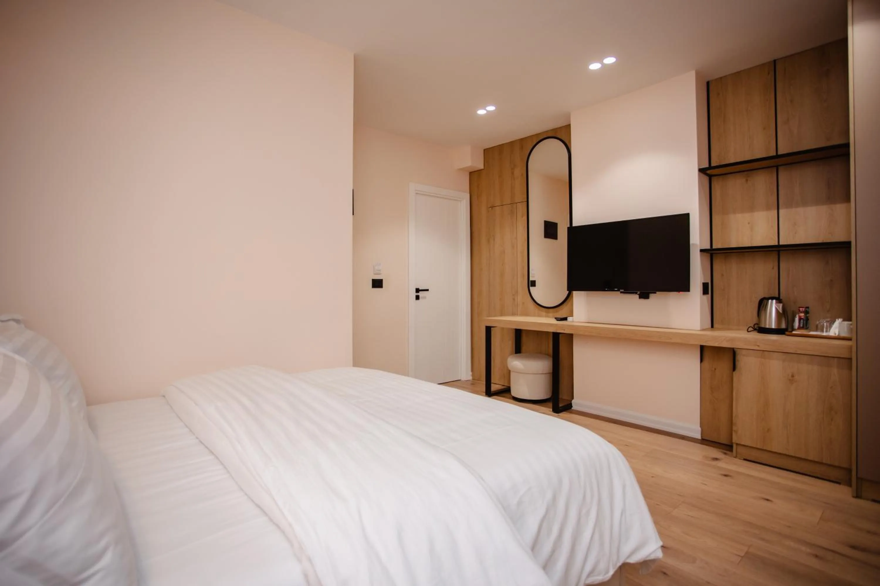 Bed in Oro Inn Hotel