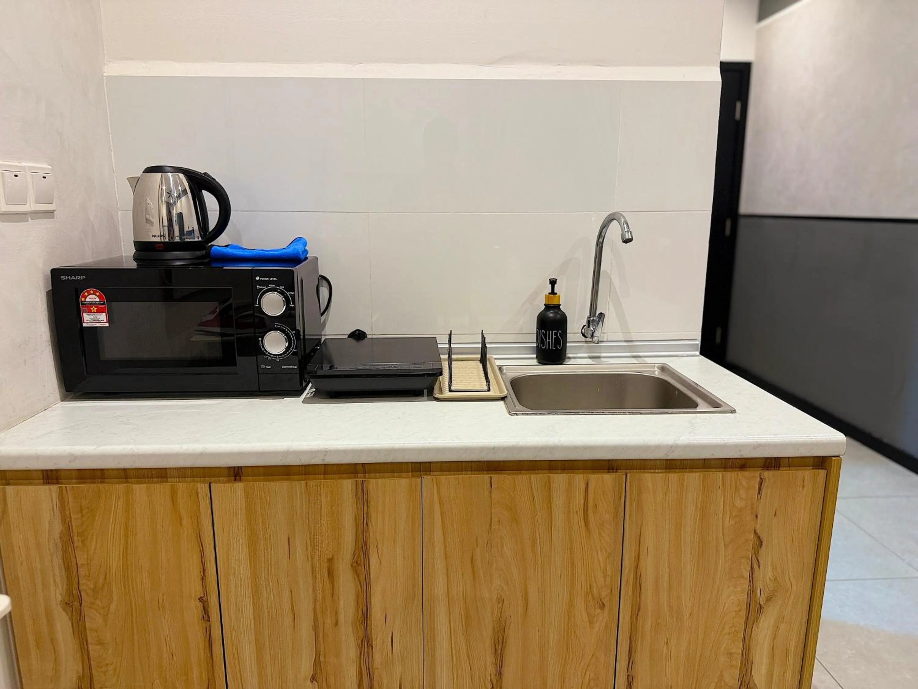 Kitchen or kitchenette in Neu Suites By Serenity Homes Near Gleneagles, KLCC & LRT