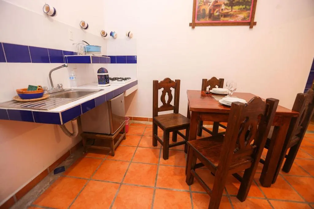 Kitchen or kitchenette in Íkaro Suites Colonial