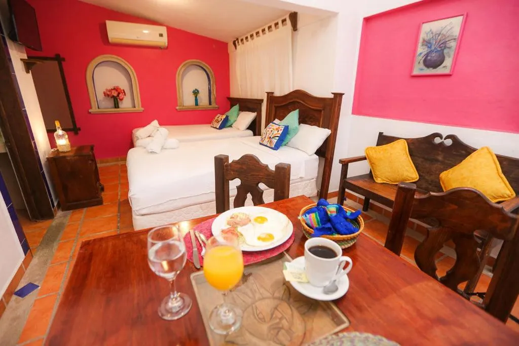 Bed in Íkaro Suites Colonial