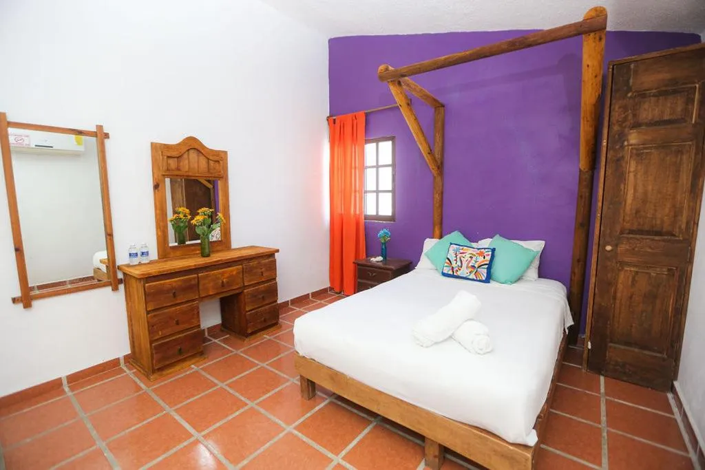 Bed in Íkaro Suites Colonial