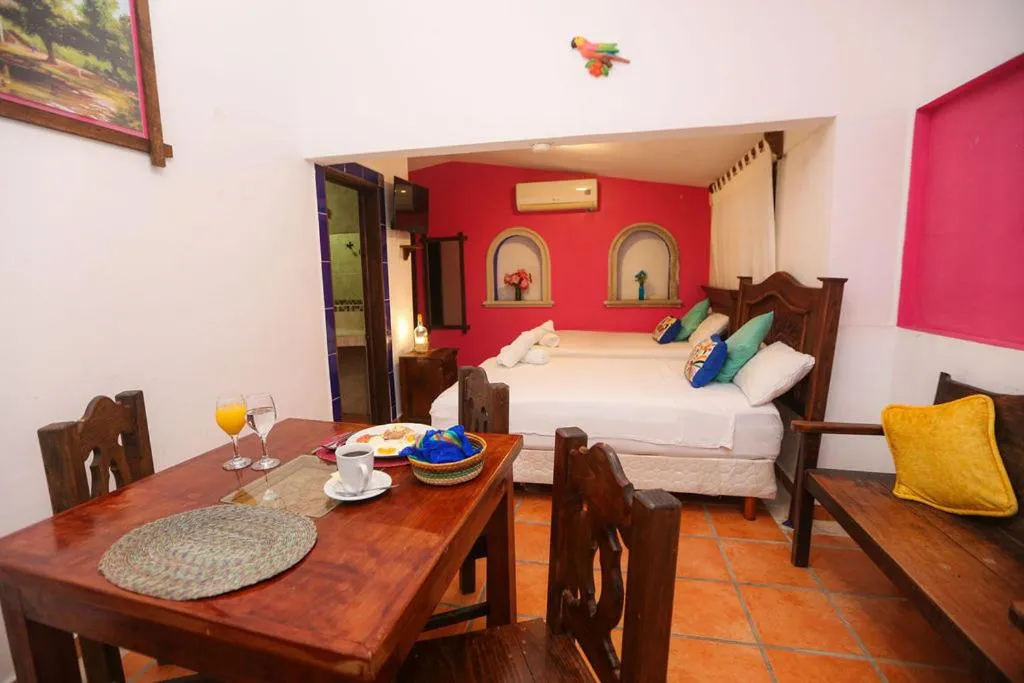 Bed in Íkaro Suites Colonial