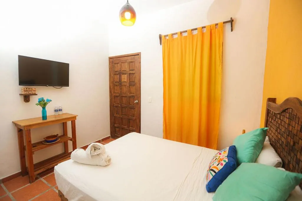 Bed in Íkaro Suites Colonial