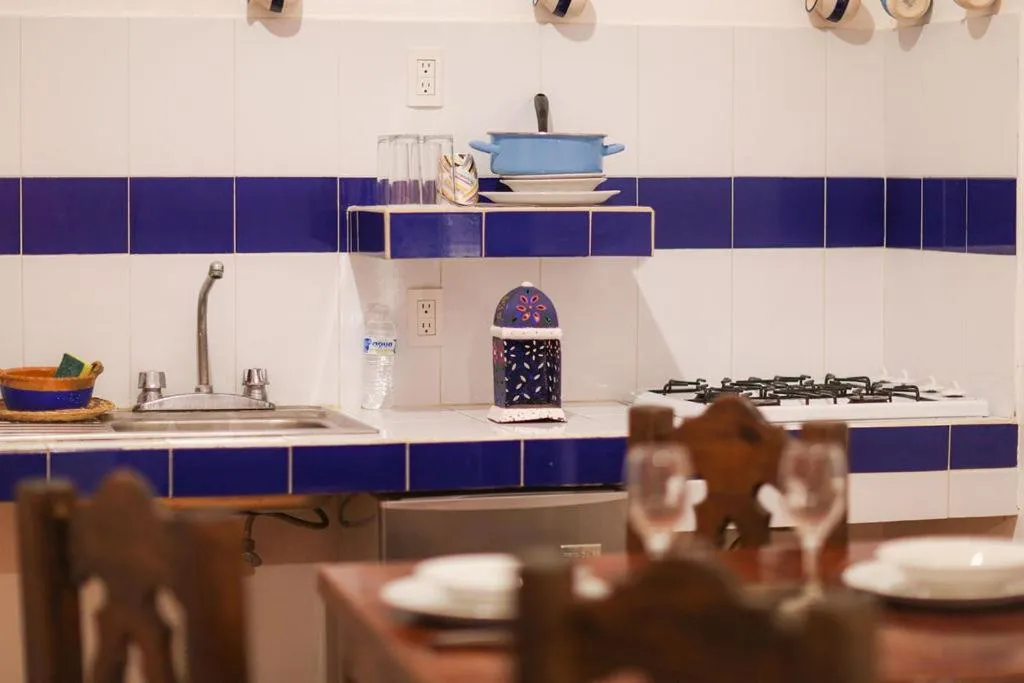 Kitchen or kitchenette in Íkaro Suites Colonial