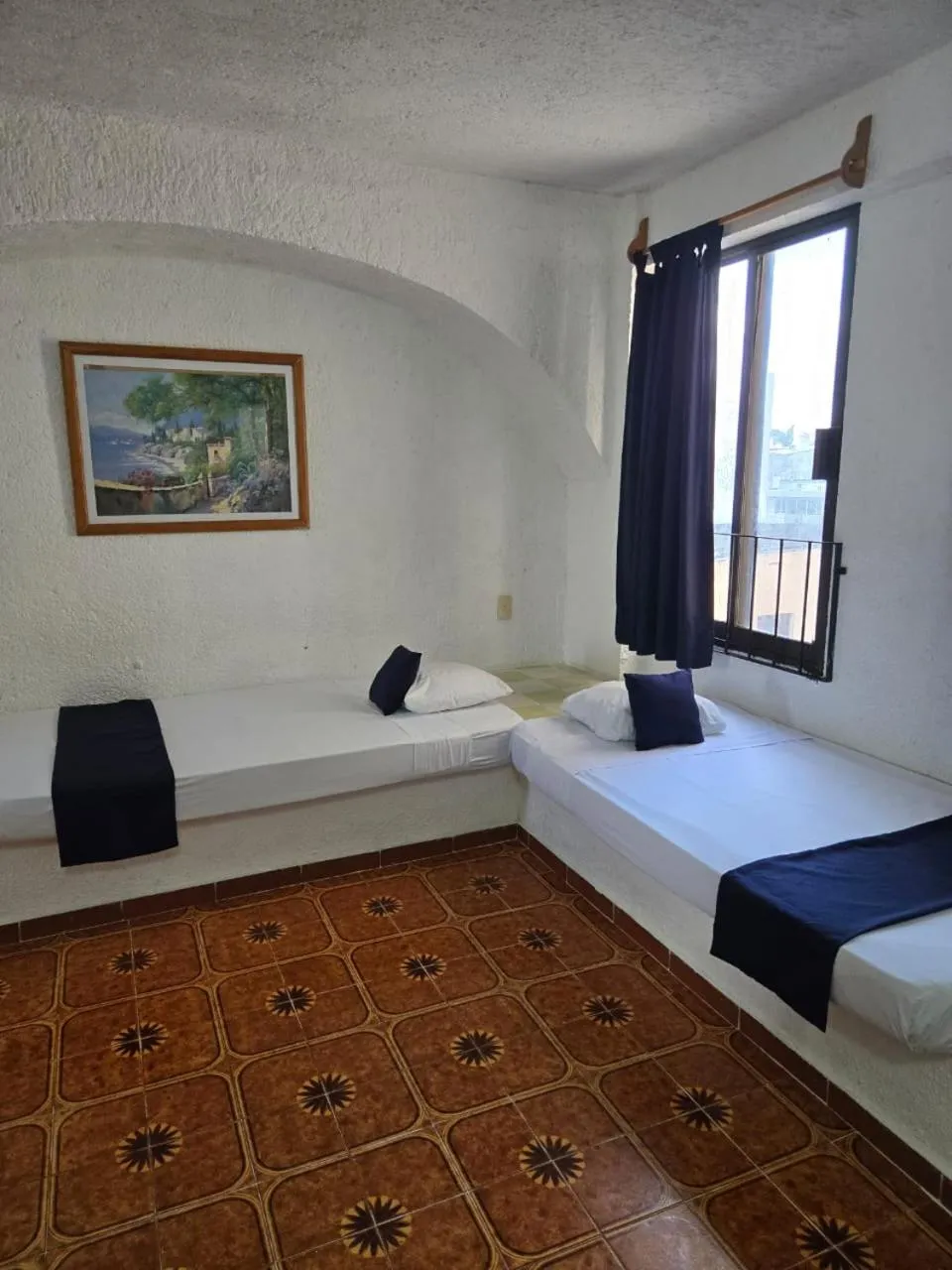 Bed in Íkaro Suites Cancún