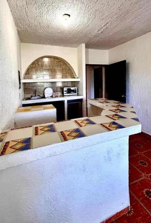 Bed in Íkaro Suites Cancún