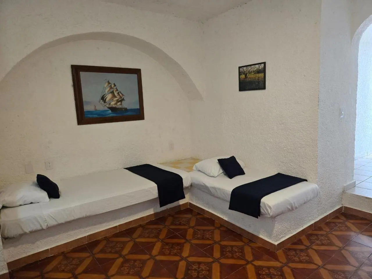 Bed in Íkaro Suites Cancún