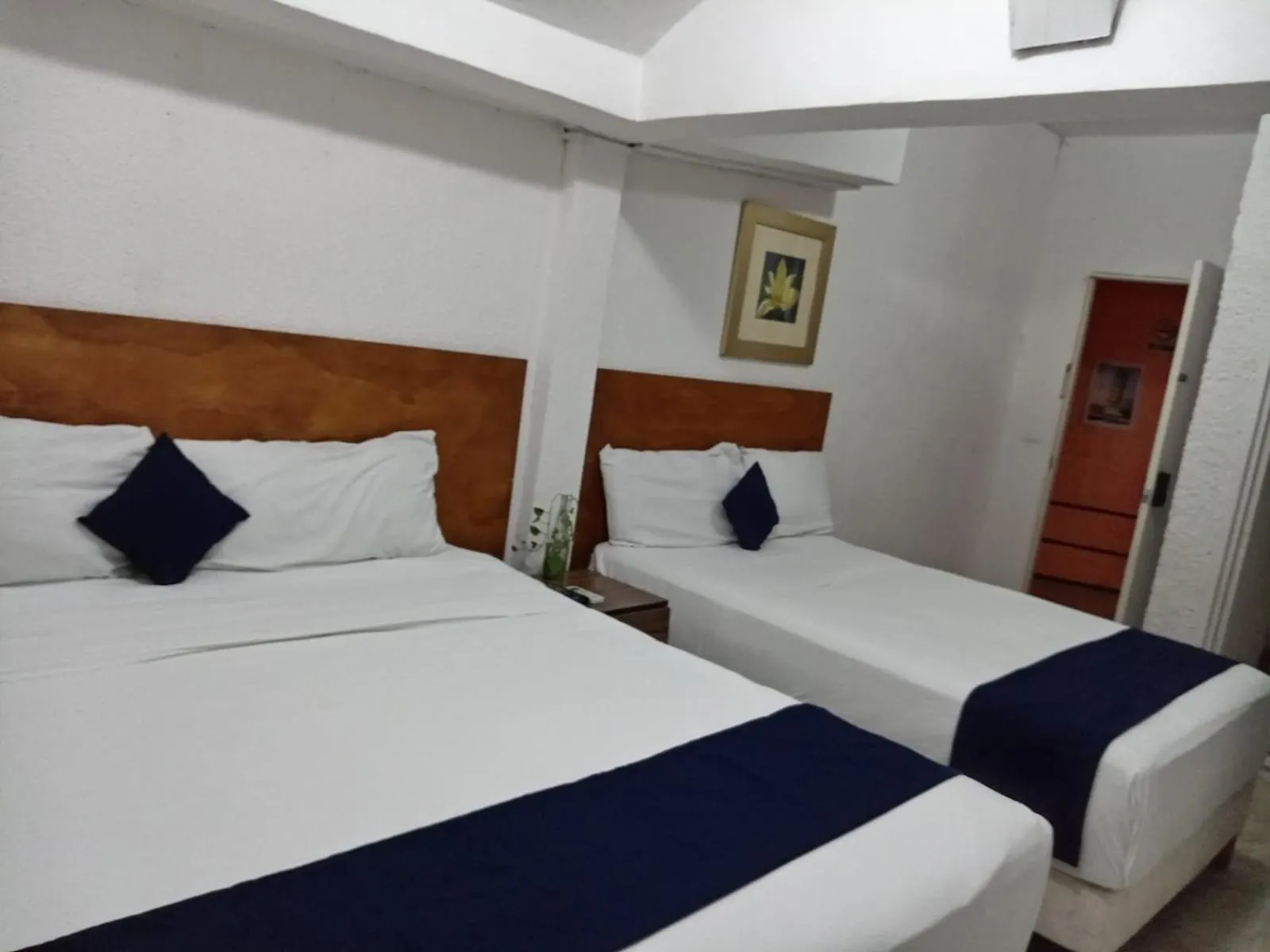 Bed in Íkaro Suites Cancún