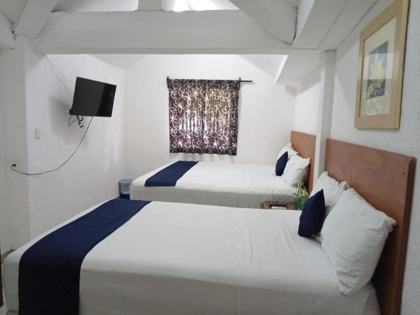 Bed in Íkaro Suites Cancún