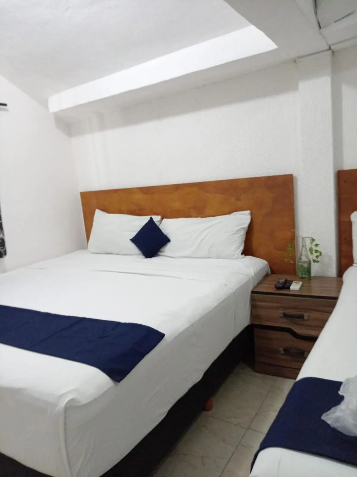 Bed in Íkaro Suites Cancún