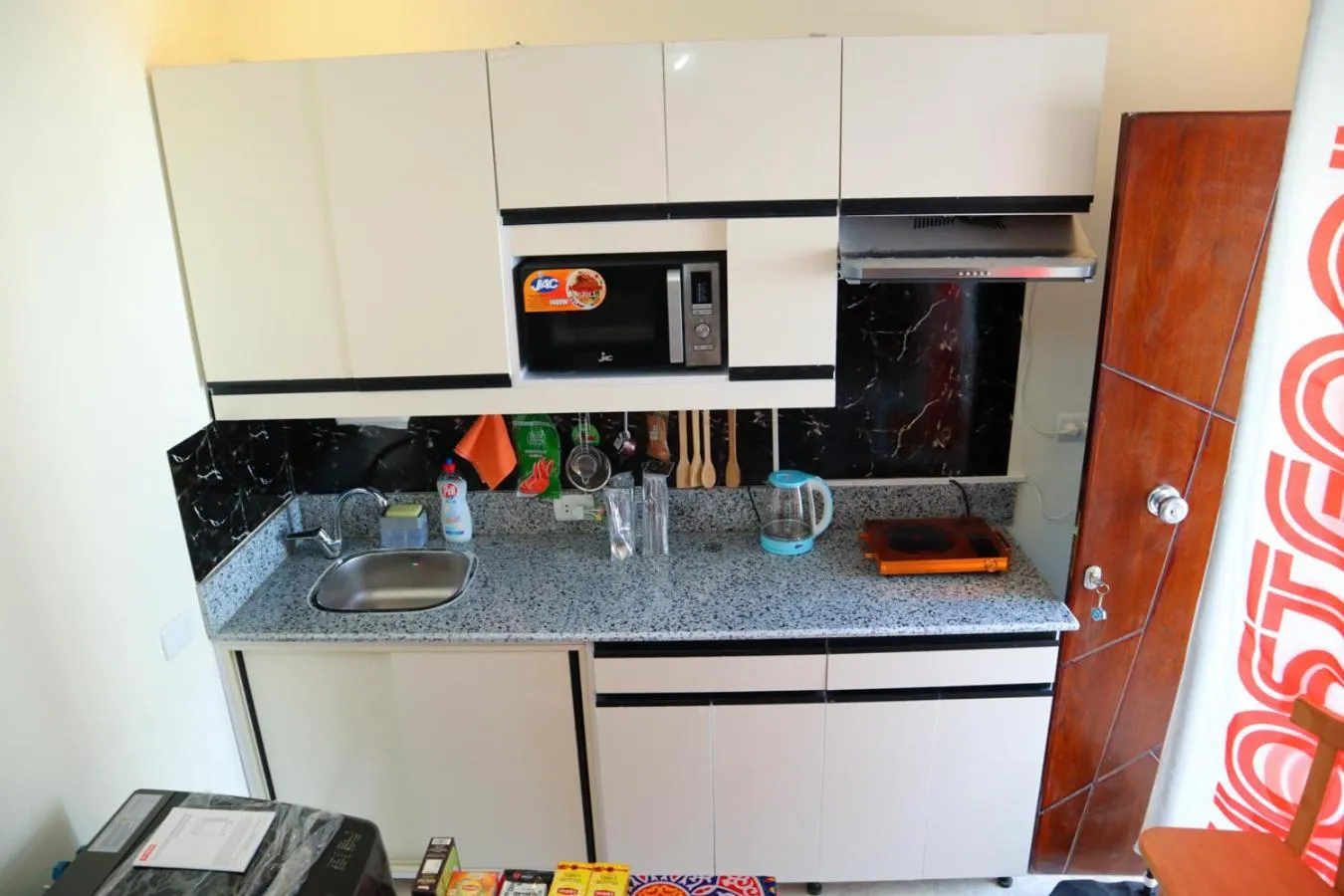 Kitchen or kitchenette in Hostgool Beach Chalets Mirage bay resort & aqua park