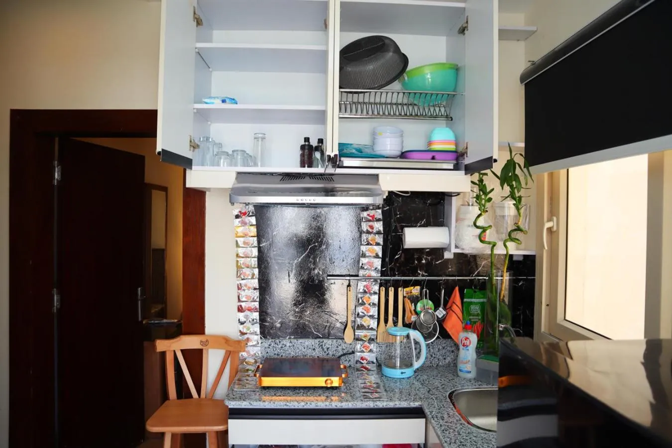 Kitchen or kitchenette in Hostgool Beach Chalets Mirage bay resort & aqua park