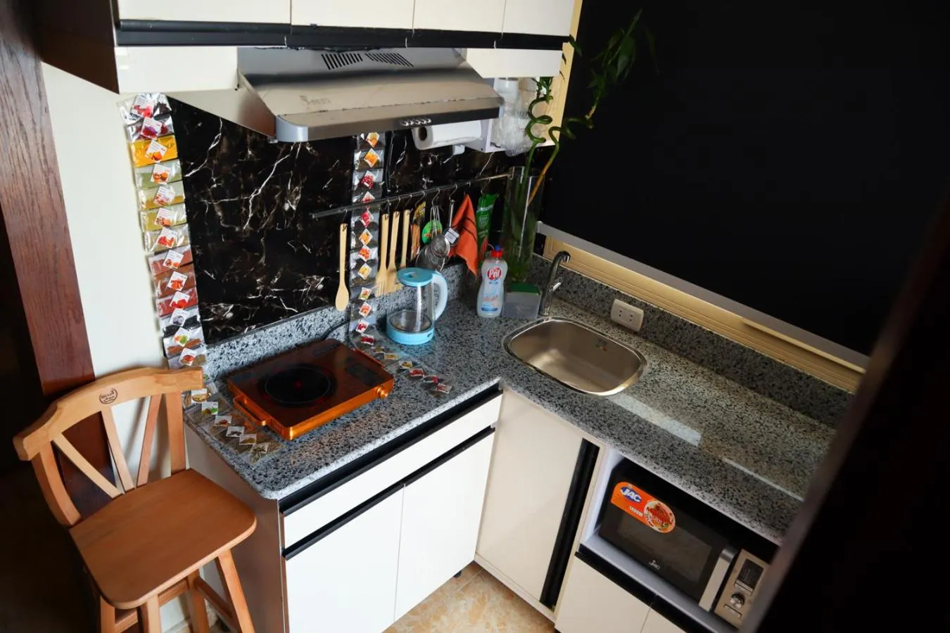 Kitchen or kitchenette in Hostgool Beach Chalets Mirage bay resort & aqua park