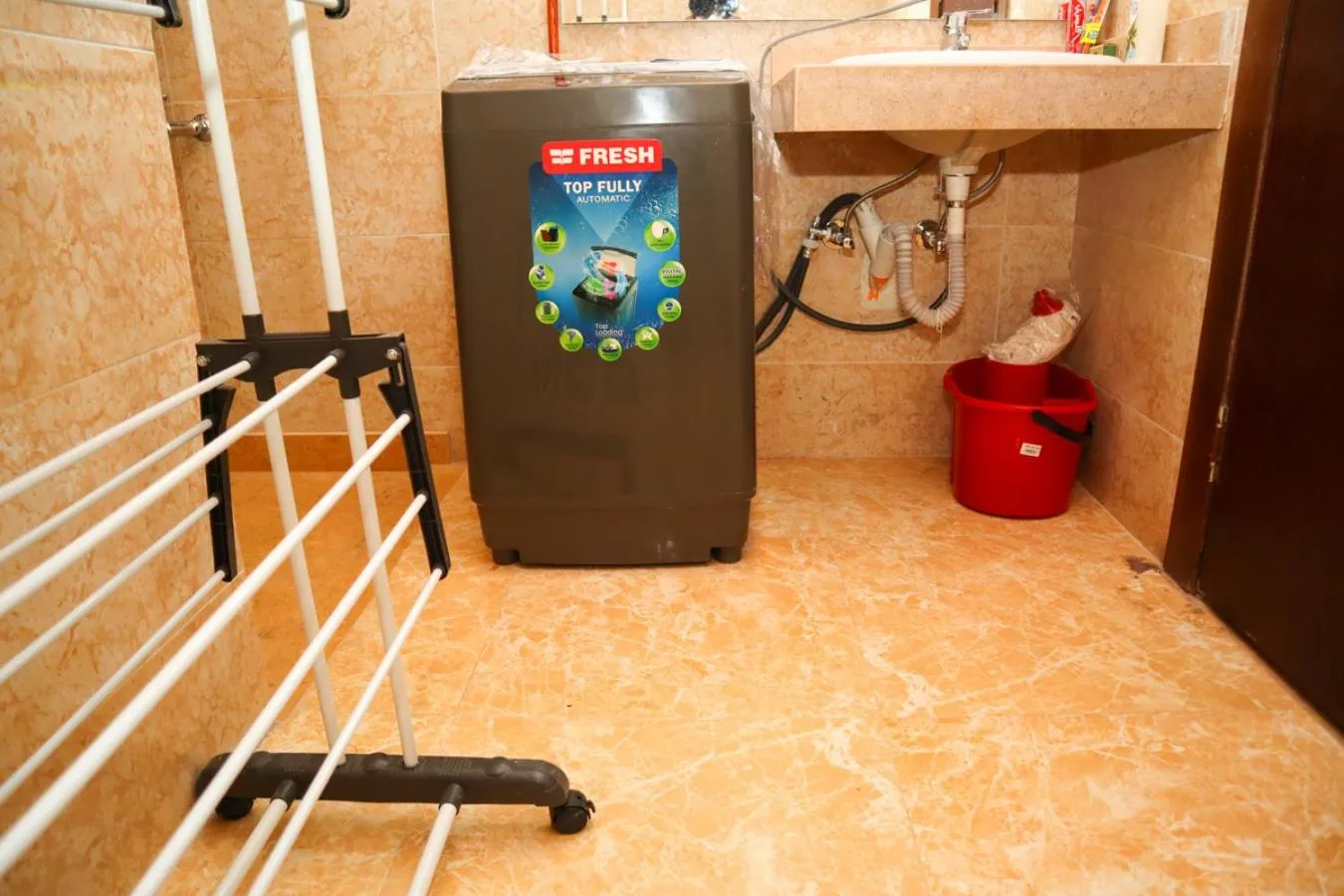 washing machine in Hostgool Beach Chalets Mirage bay resort & aqua park