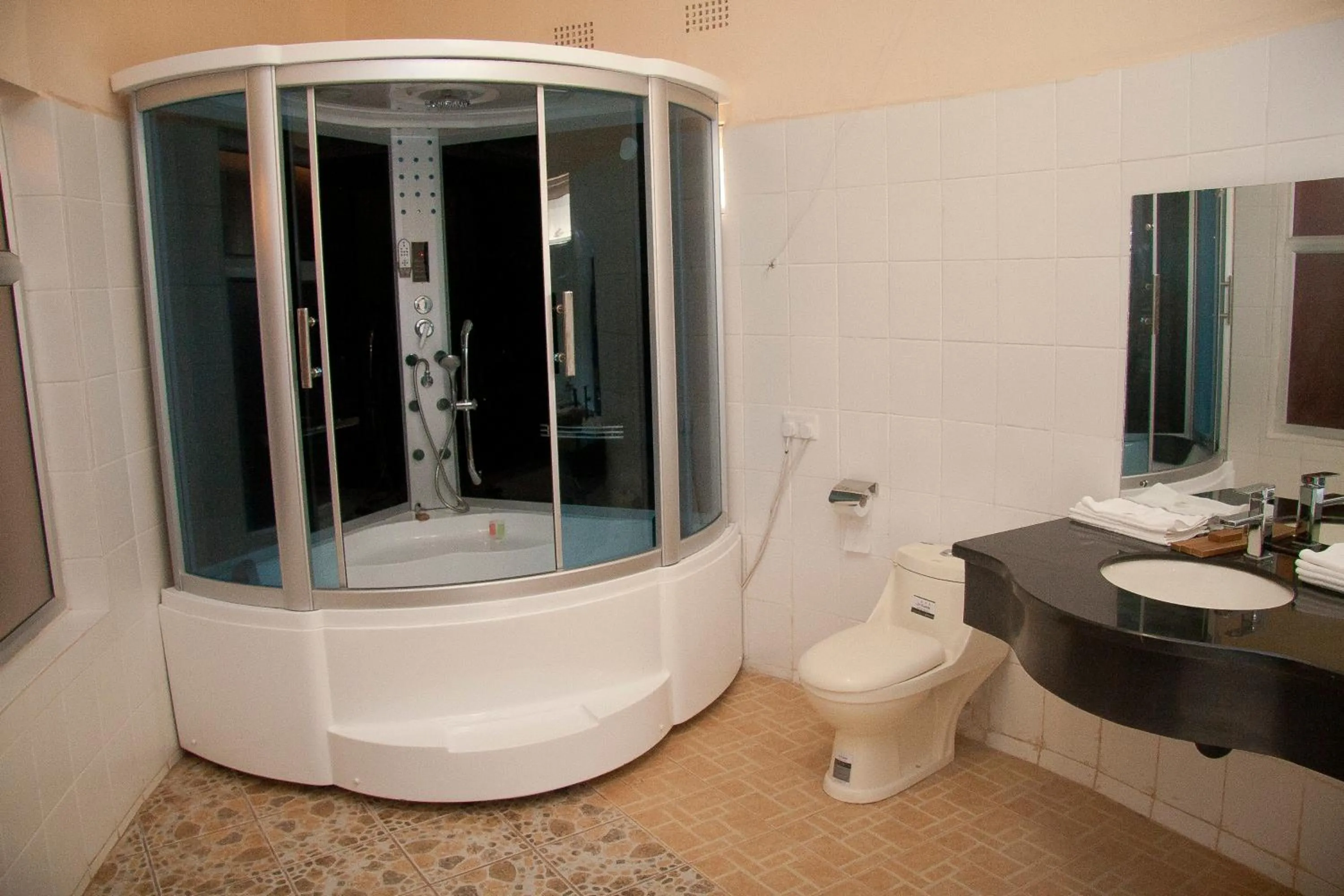 Shower in Chamba Valley Exotic Hotel