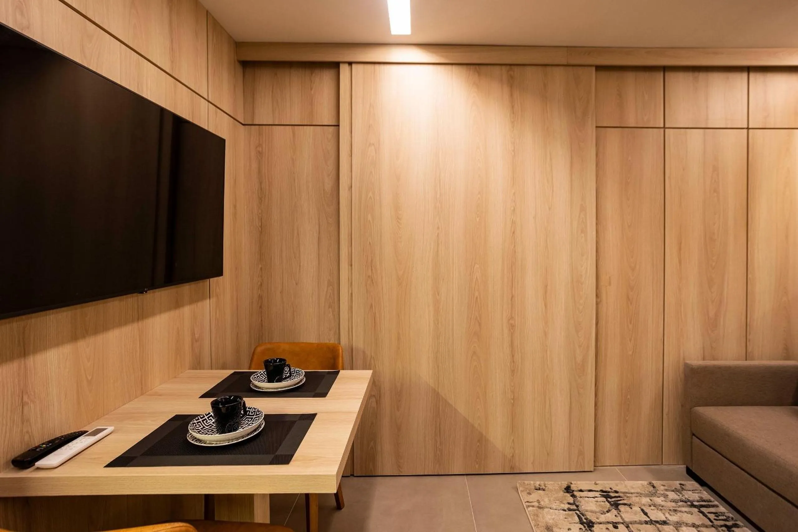 Living room in HIT Itaim