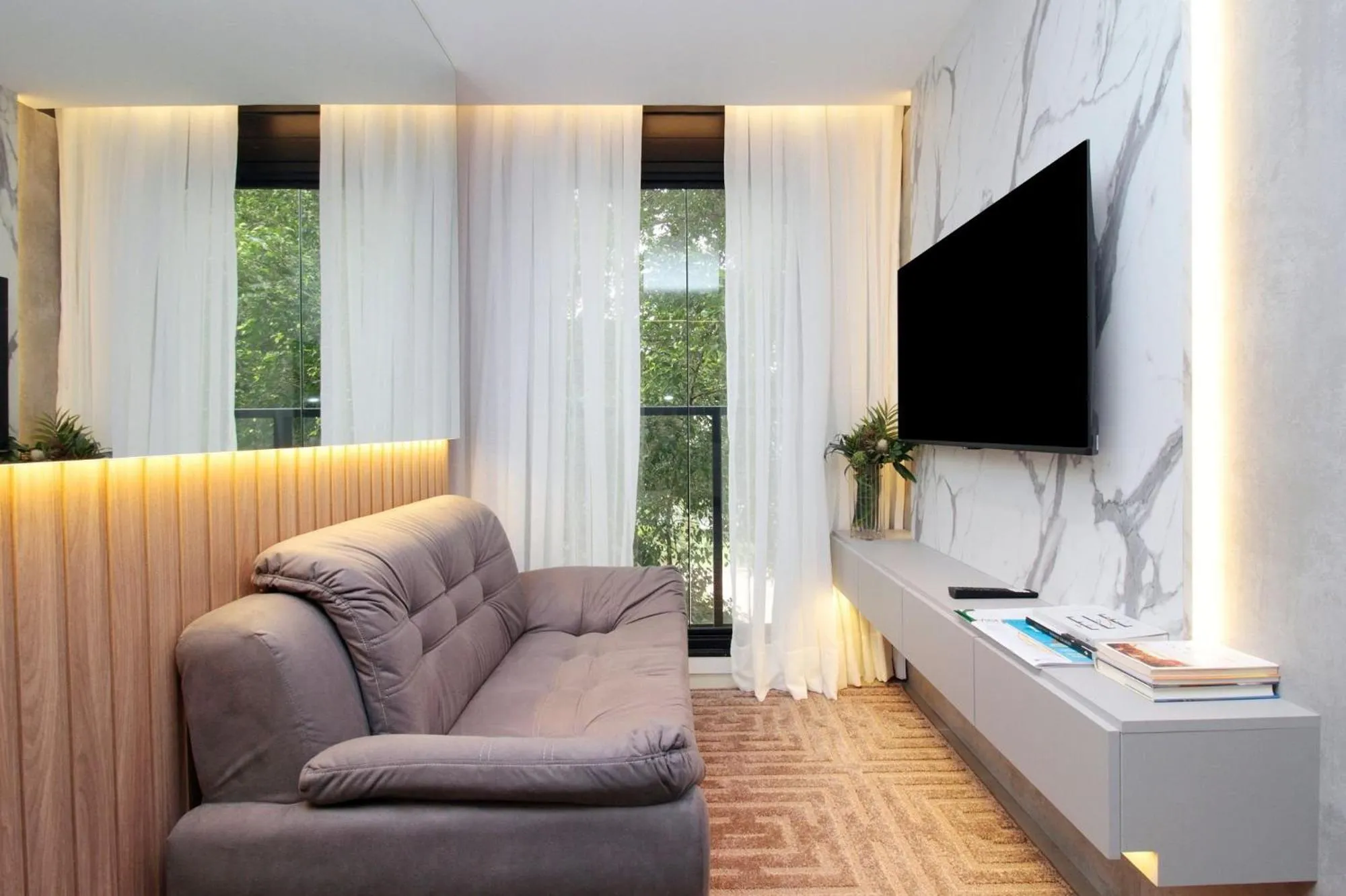 Living room in HIT Itaim