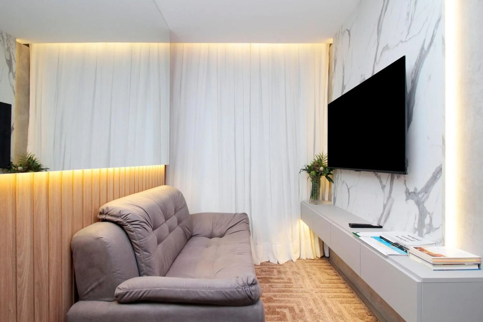 Living room in HIT Itaim