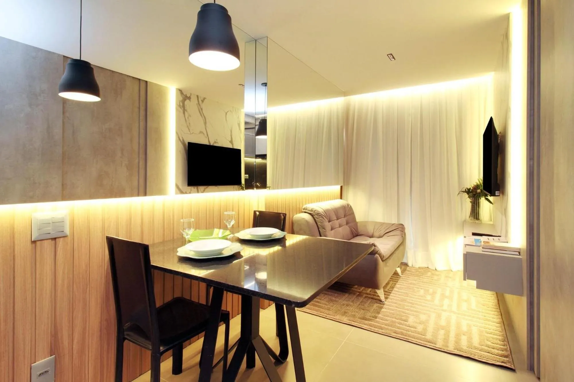 Living room in HIT Itaim