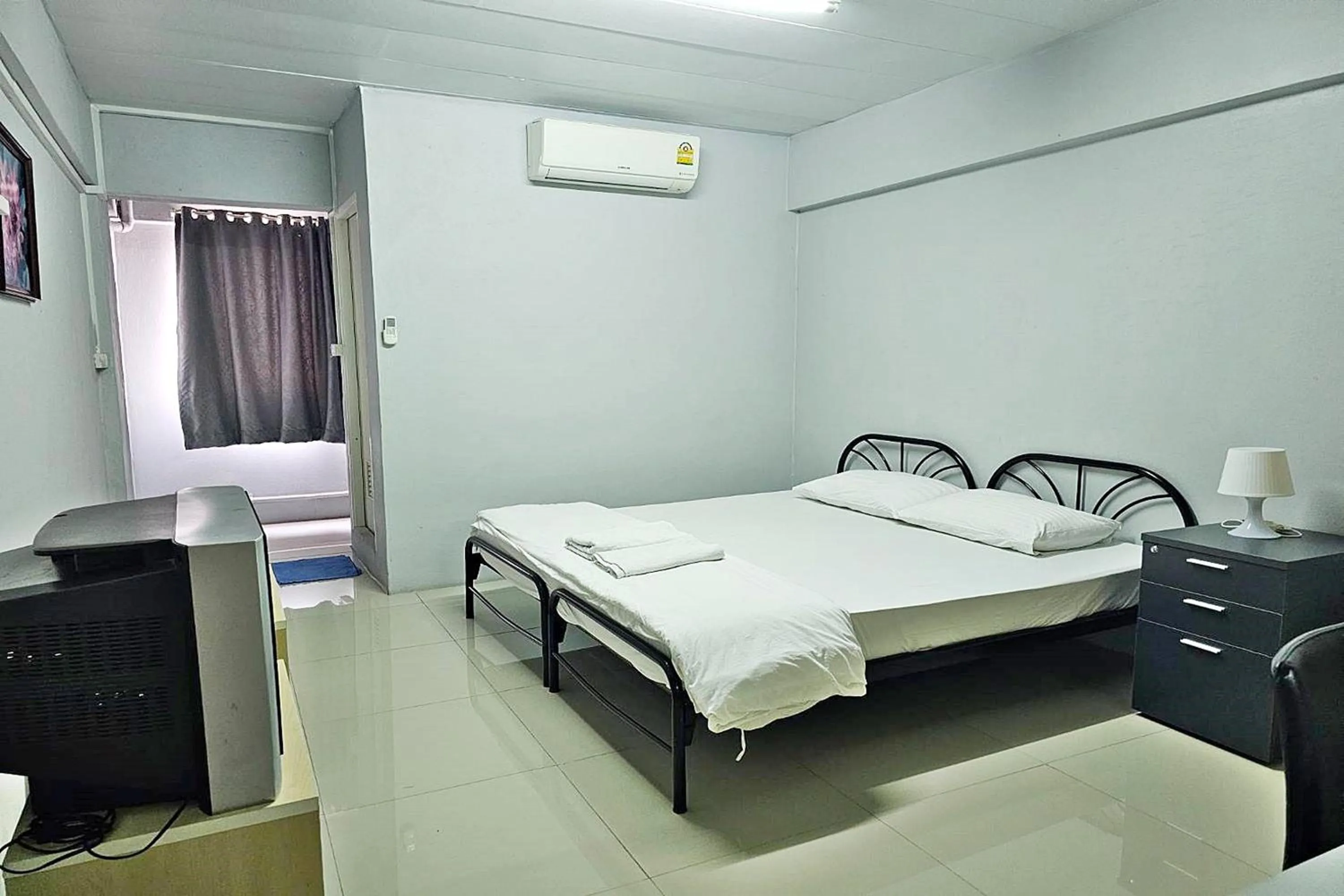 Bed in Toucan Bed and Cafe