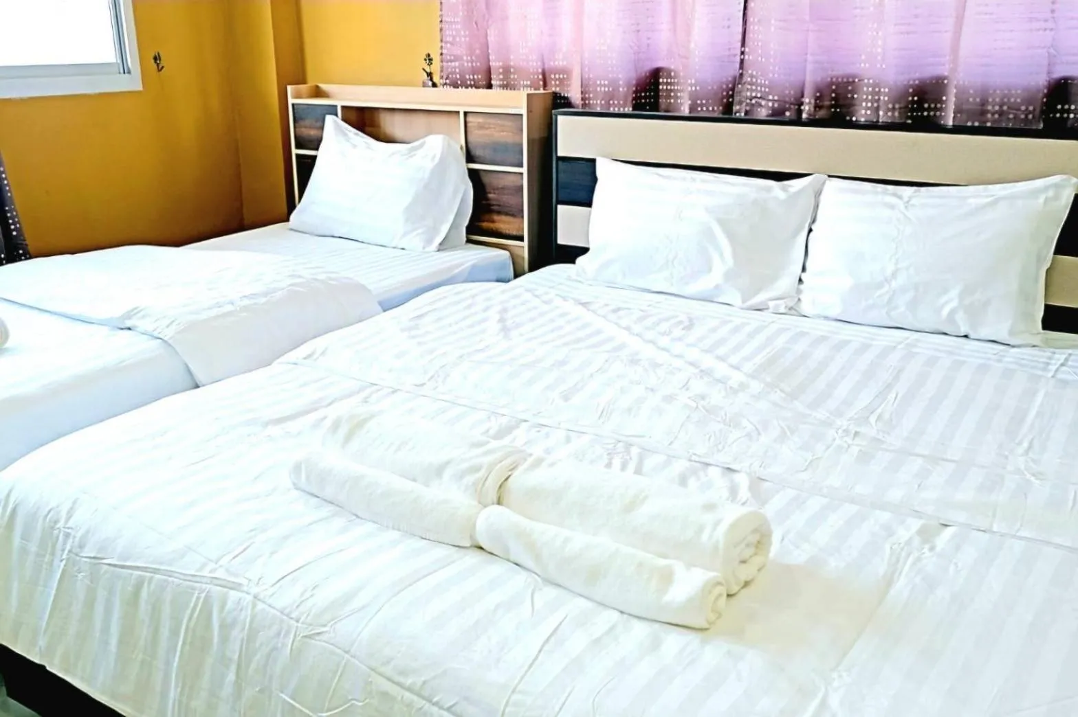 Bed in The Bua Boutique Resort