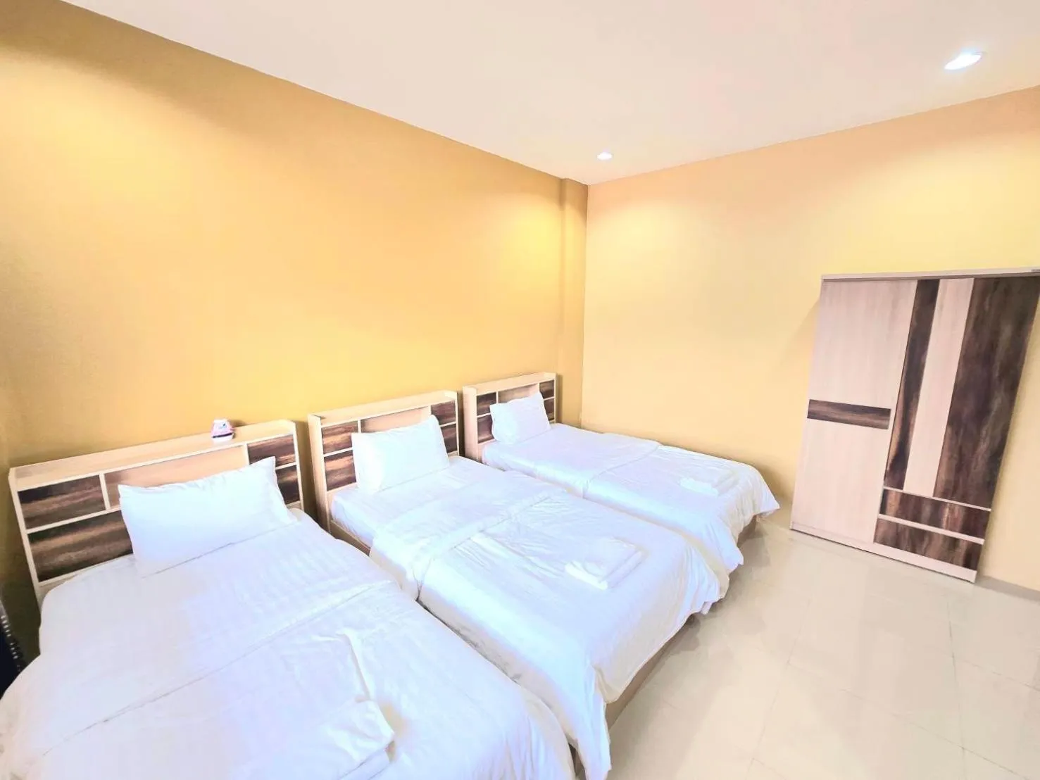 Bed in The Bua Boutique Resort