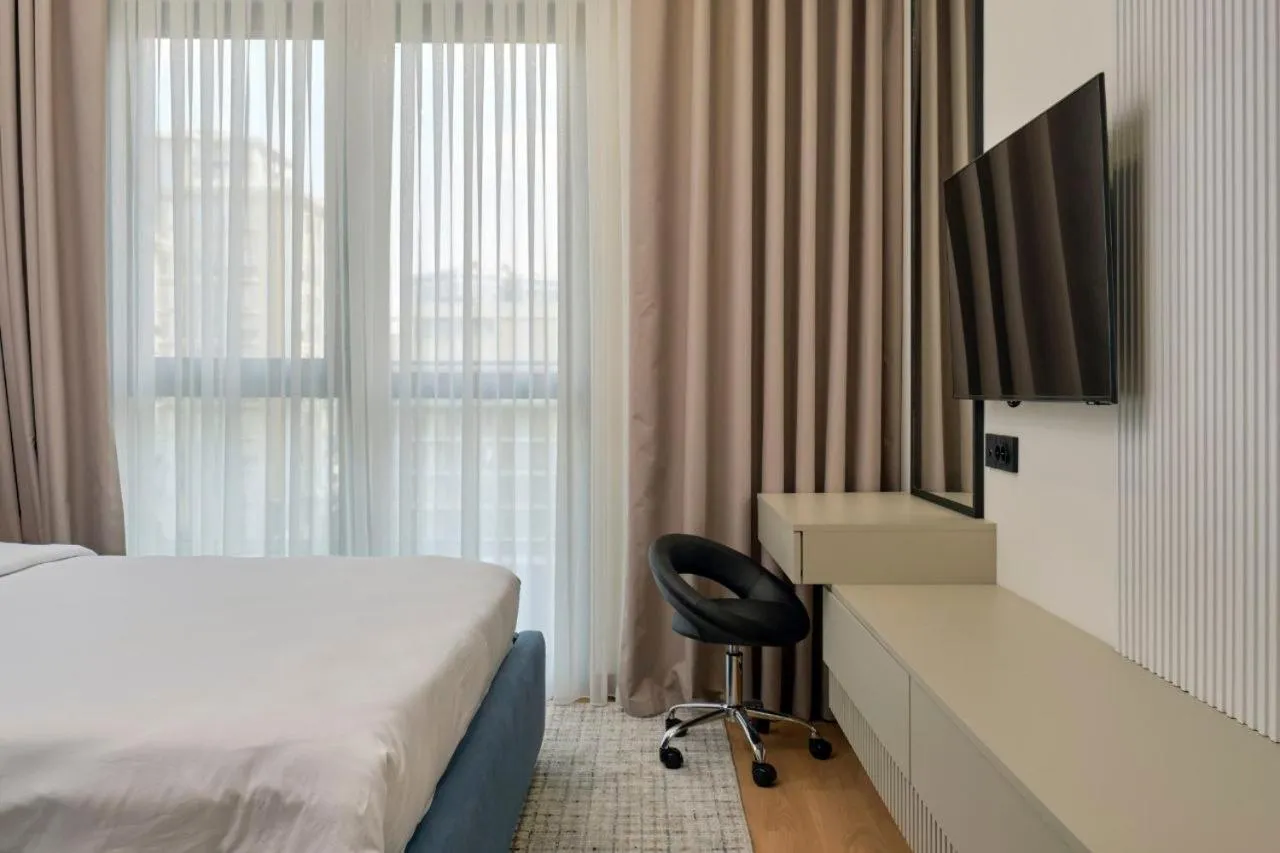 Bed in STYLO Residences & Suites