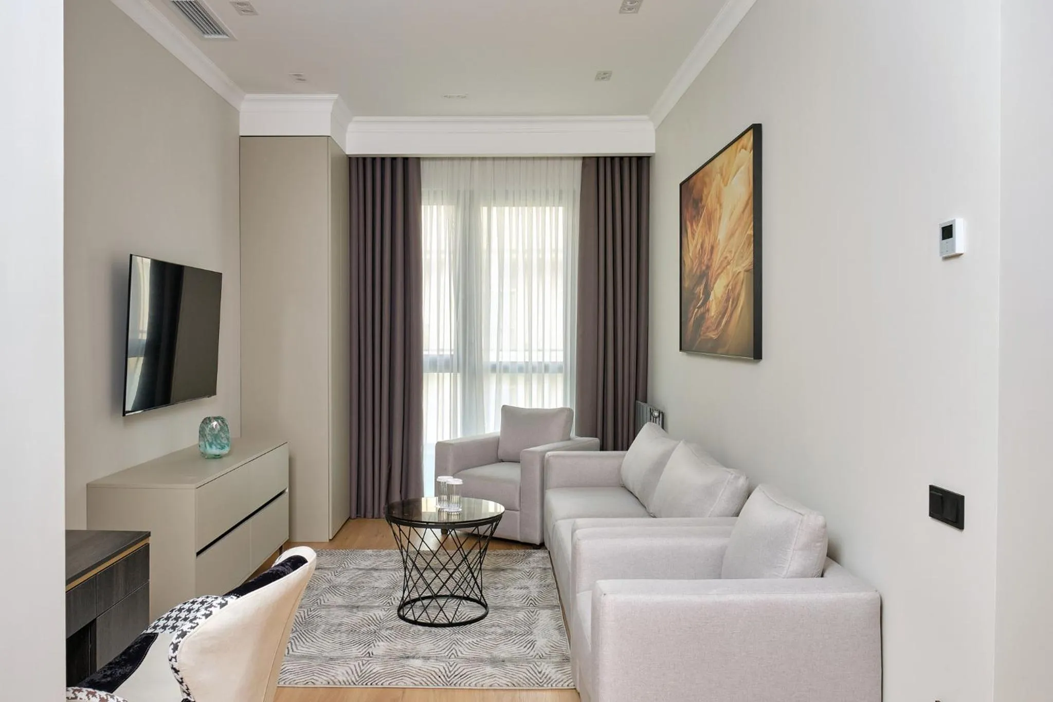 Communal lounge/ TV room in STYLO Residences & Suites