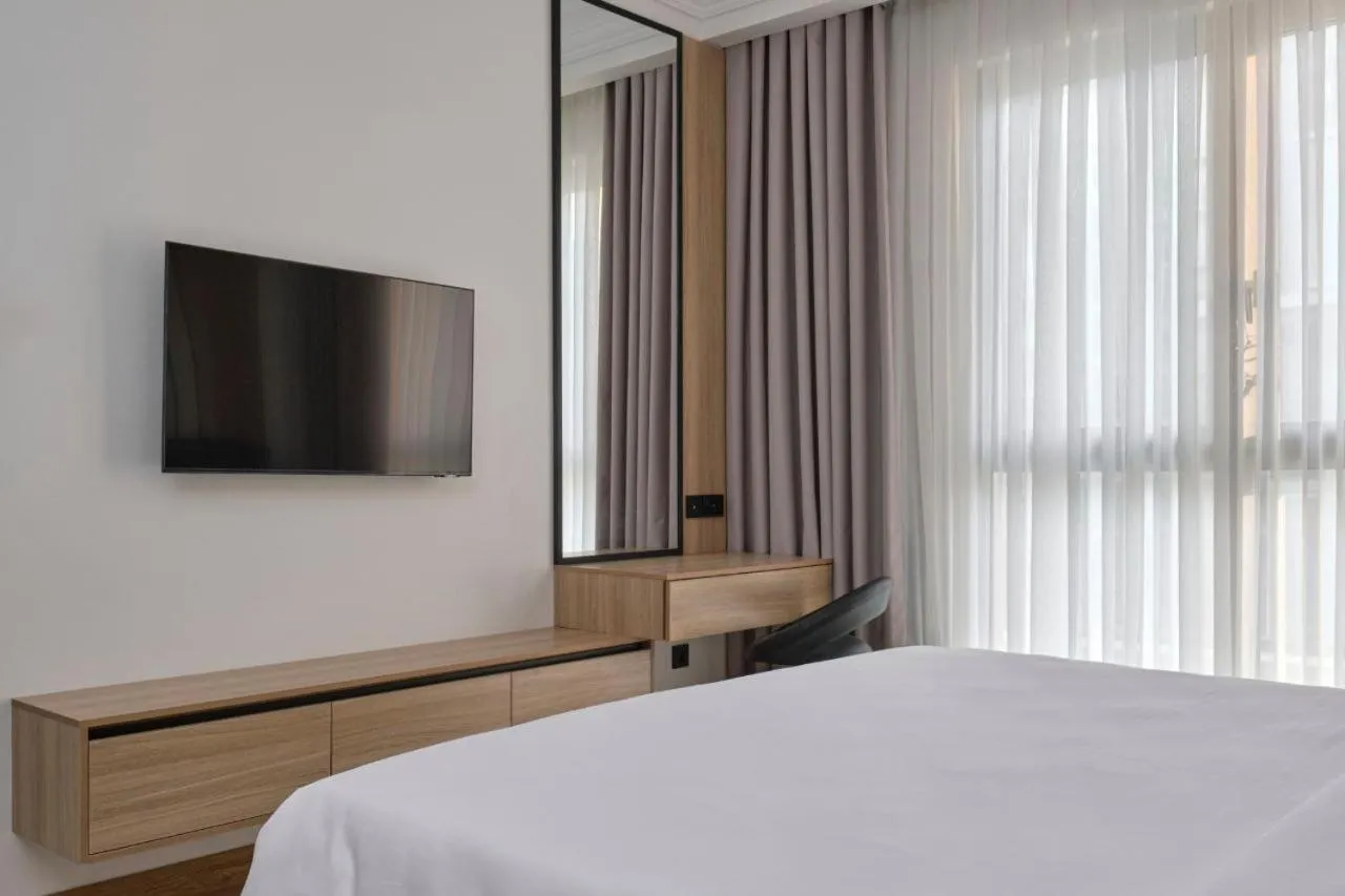 Bed in STYLO Residences & Suites