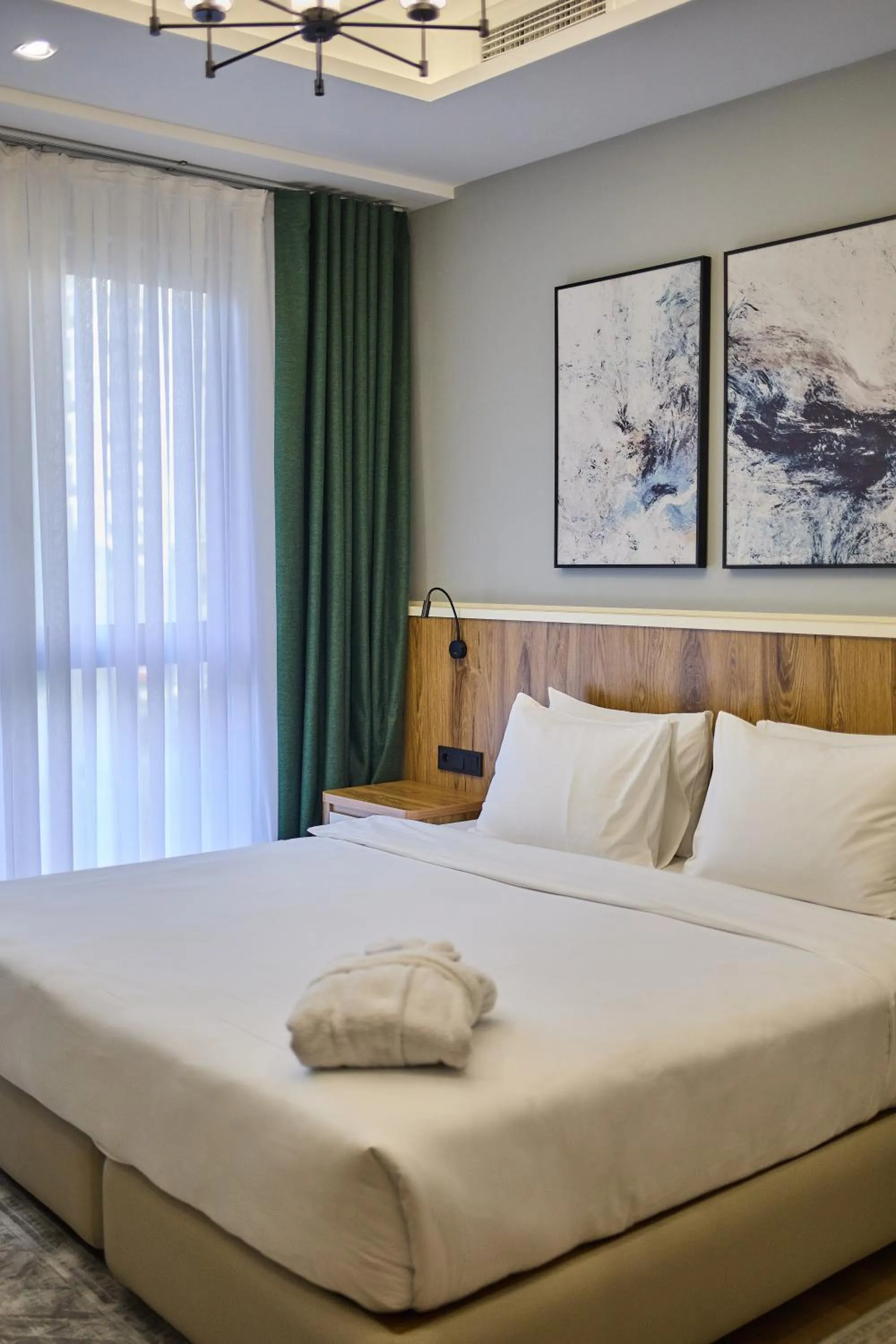 Bed in STYLO Residences & Suites