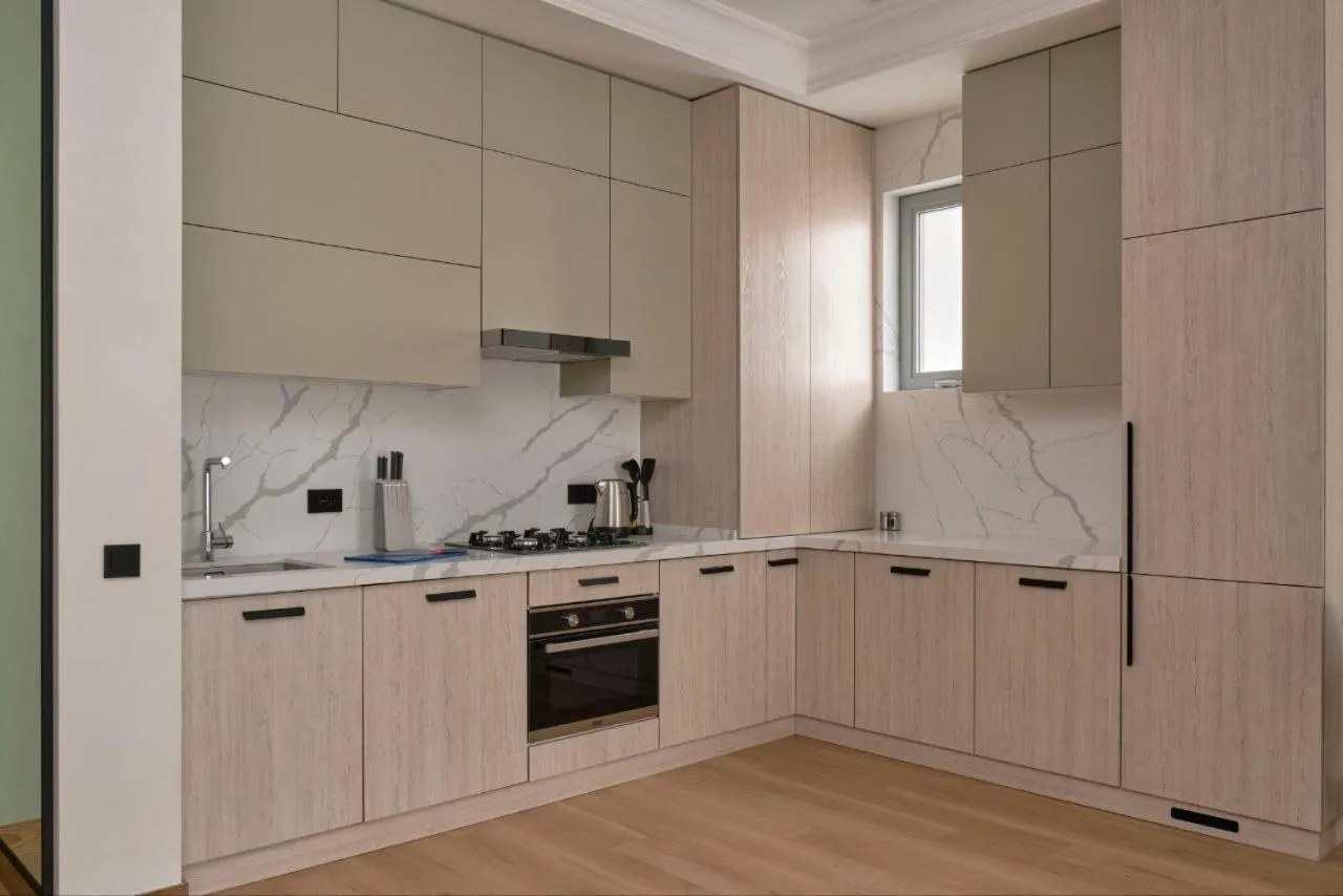 Kitchen or kitchenette in STYLO Residences & Suites