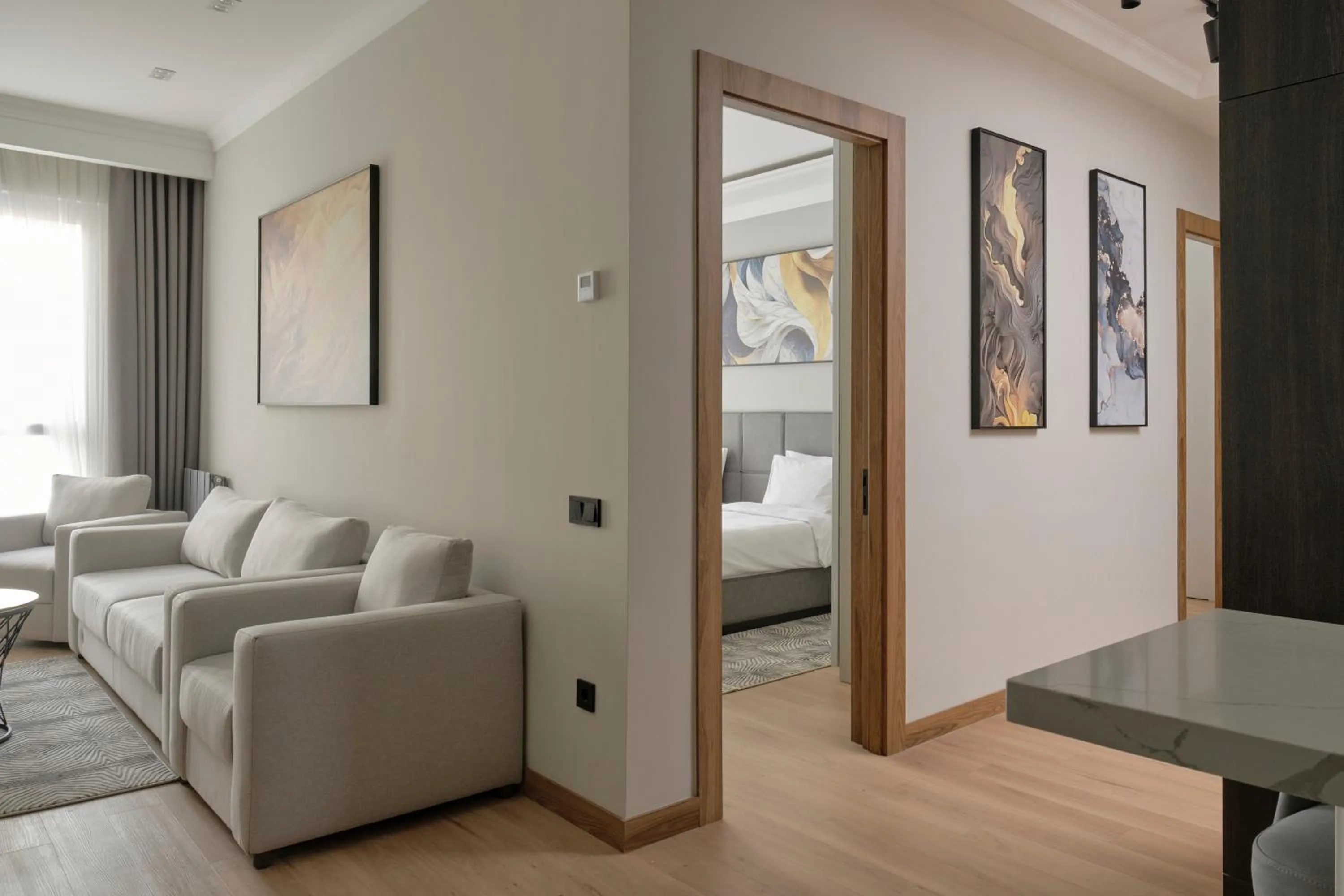 Living room, Bed in STYLO Residences & Suites