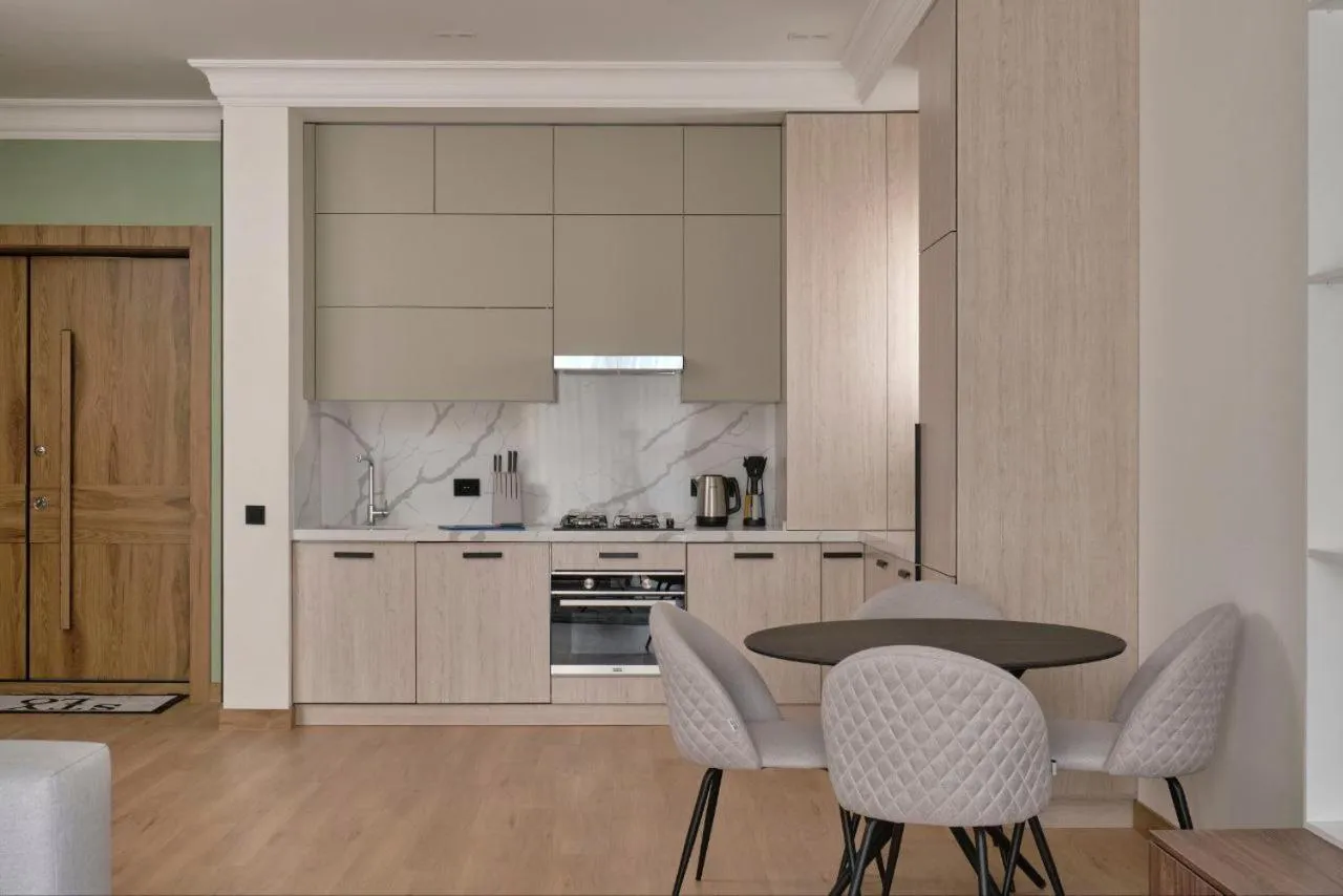 Kitchen or kitchenette in STYLO Residences & Suites