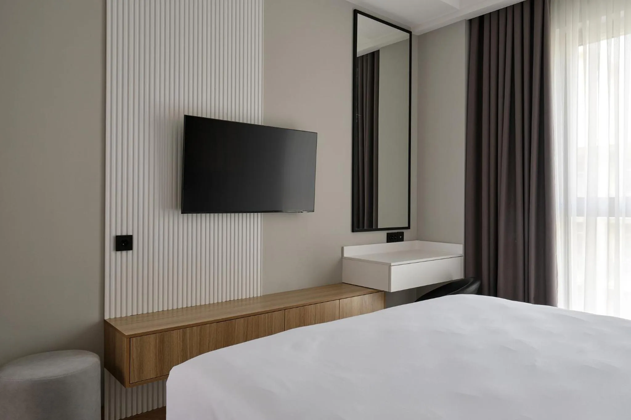 Bed in STYLO Residences & Suites