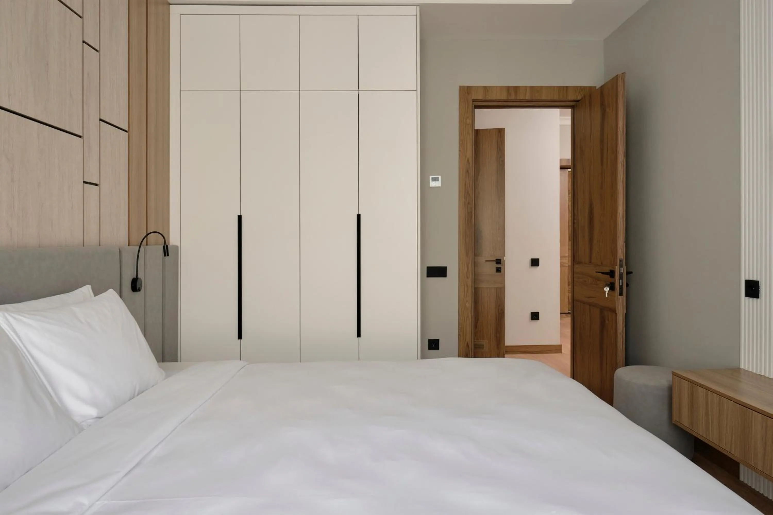 Bed in STYLO Residences & Suites